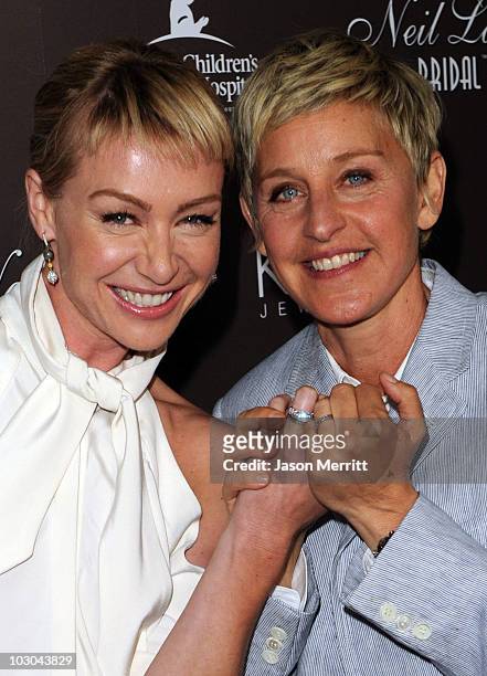 Actress Portia de Rossi and TV personality Ellen DeGeneres arrive at celebrated jewelry designer Neil Lane's debut of his new bridal collection with...