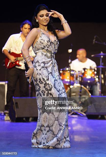 Lebanese pop star Haifa Wehbe performs during the Batroun International Festival in the coastal city of Batroun, north of Beirut, late on July 22,...