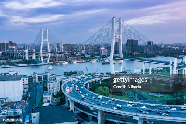 highway and nanpu bridge in shanghai, china - traffic management stock pictures, royalty-free photos & images