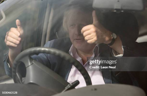 Former Foreign Secretary Boris Johnson arrives at his home on September 10, 2018 in Thame, England.