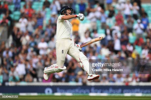 Joe Root of England celebrates reaching his century during the Specsavers 5th Test - Day Four between England and India at The Kia Oval on September...