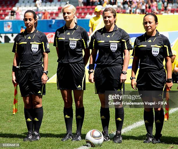 Referees Marlene Duffy, Karolina Radzik-Johan, Carol Anne Chenard and Veronika Perez pose during the FIFA U20 Women's World Cup Group B match between...