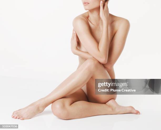 beauty shot full body - seated figure stock pictures, royalty-free photos & images