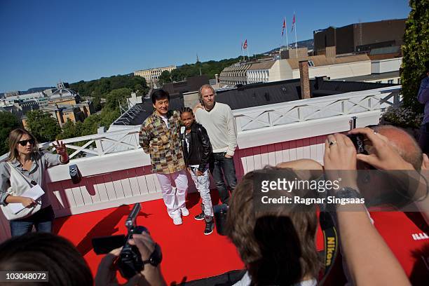 Jackie Chan, Jaden Smith and Harald Zwart attend a photocall to promote 'The Karate Kid' on July 23, 2010 in Oslo, Norway.