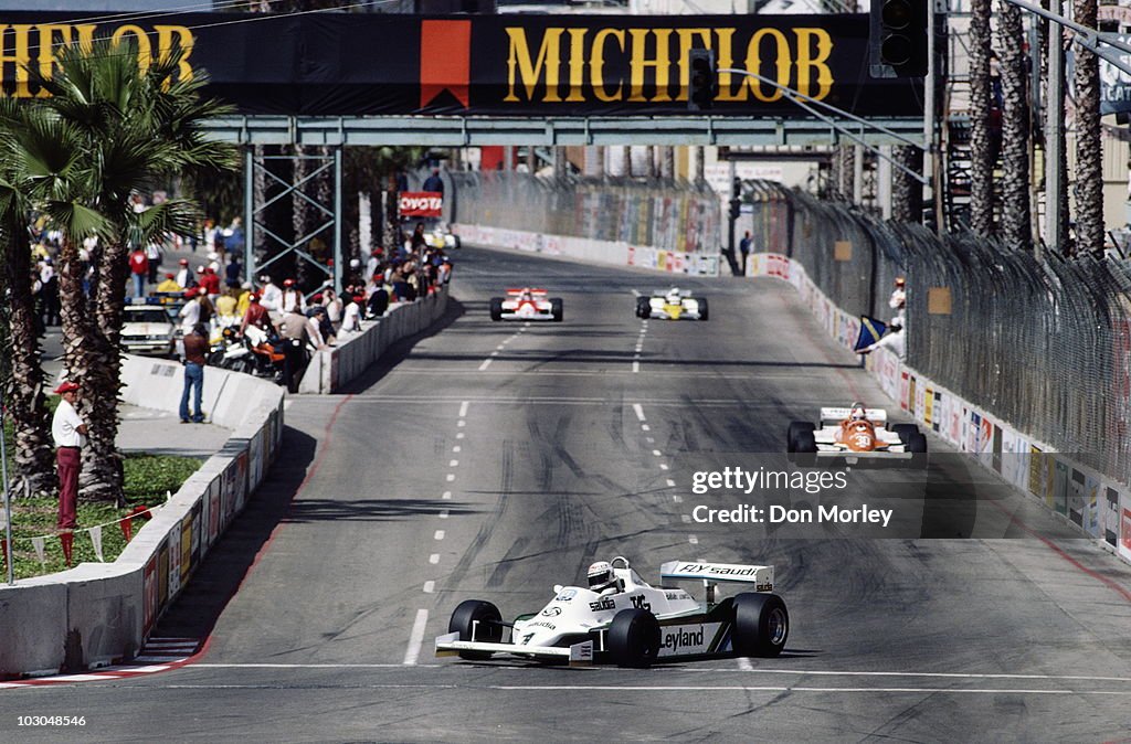 Alan West Racing Alan Jones drives the Albilad Williams Racing Team Williams FW07C ...