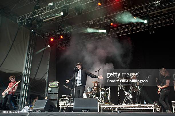 Christopher Purcell, James Smith, Nick Rice, Alice Spooner and Daniel 'Pilau' Rice of Hadouken perform on the main stage during day one of Guilfest...