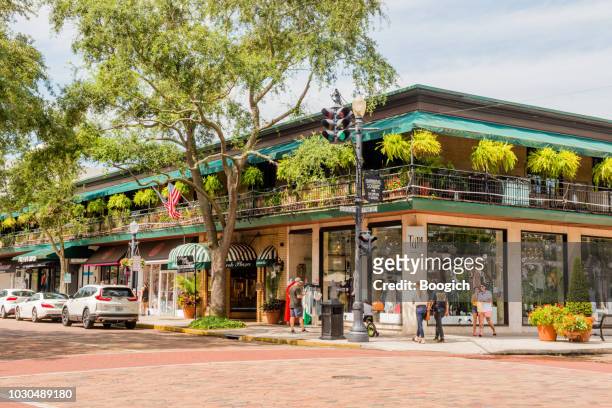 park avenue in downtown winter park florida usa - orlando florida stock pictures, royalty-free photos & images