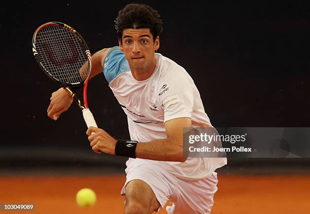 Thomaz Bellucci of Brasil returns a backhand during his Quarter Final match against Andreas Seppi of Italy during the International German Open at...