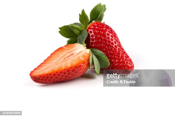 red ripe strawberry fruits on a white background - strawberry foto e immagini stock