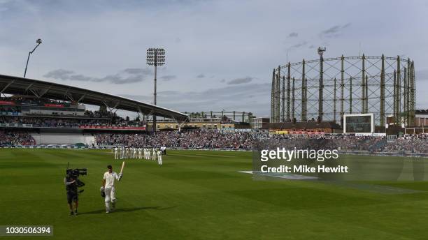 Alastair Cook of England exits the Test arena for the last time as a batsman after scoring 147 during the Specsavers 5th Test - Day Four between...