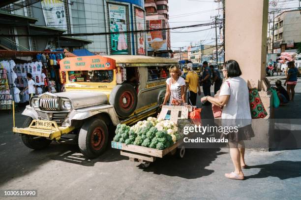 jeepney in manila, philippines - old manila stock pictures, royalty-free photos & images