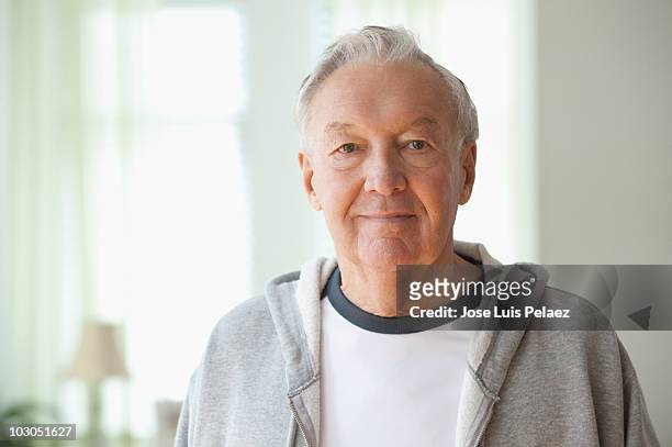 portrait of elderly man - solo un uomo anziano foto e immagini stock