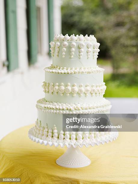 pale green tiered wedding cake - wedding cakes stock pictures, royalty-free photos & images