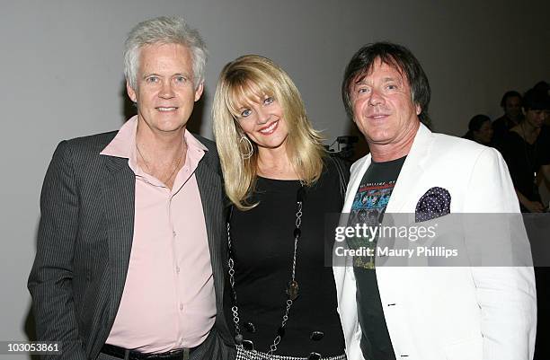 David Philp, Martha Smith and Keith England attend Herb Alpert's Black Totems Exhibition and book signing on July 22, 2010 in Los Angeles, California.