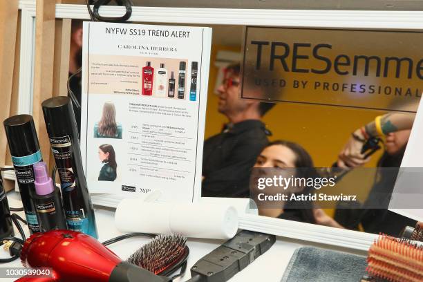 Models prepare backstage for TRESemme At Carolina Herrera during New York Fashion Week on September 10, 2018 in New York City.