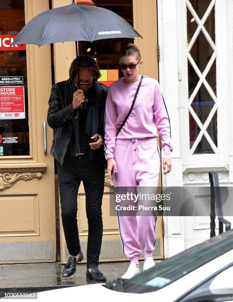Gigi Hadid is seen strolling with her father Mohamed Hadid in Soho on September 10, 2018 in New York City.