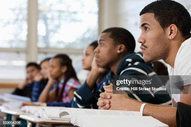 Student Listen Students Listening In Classroom Photos and Premium High Res Pictures ...