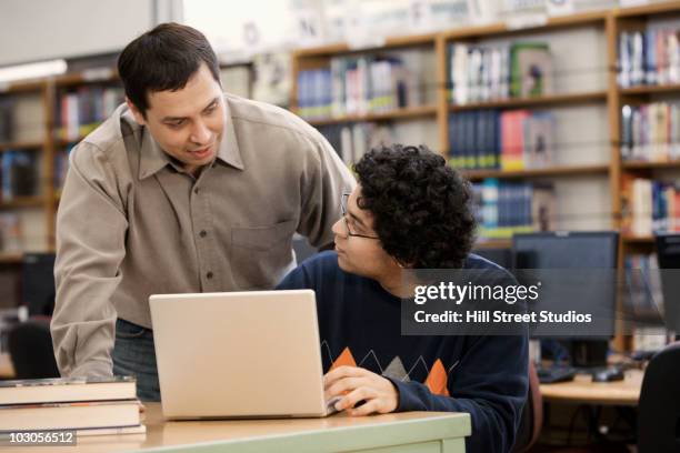Filipino Using Computer Photos and Premium High Res Pictures - Getty Images
