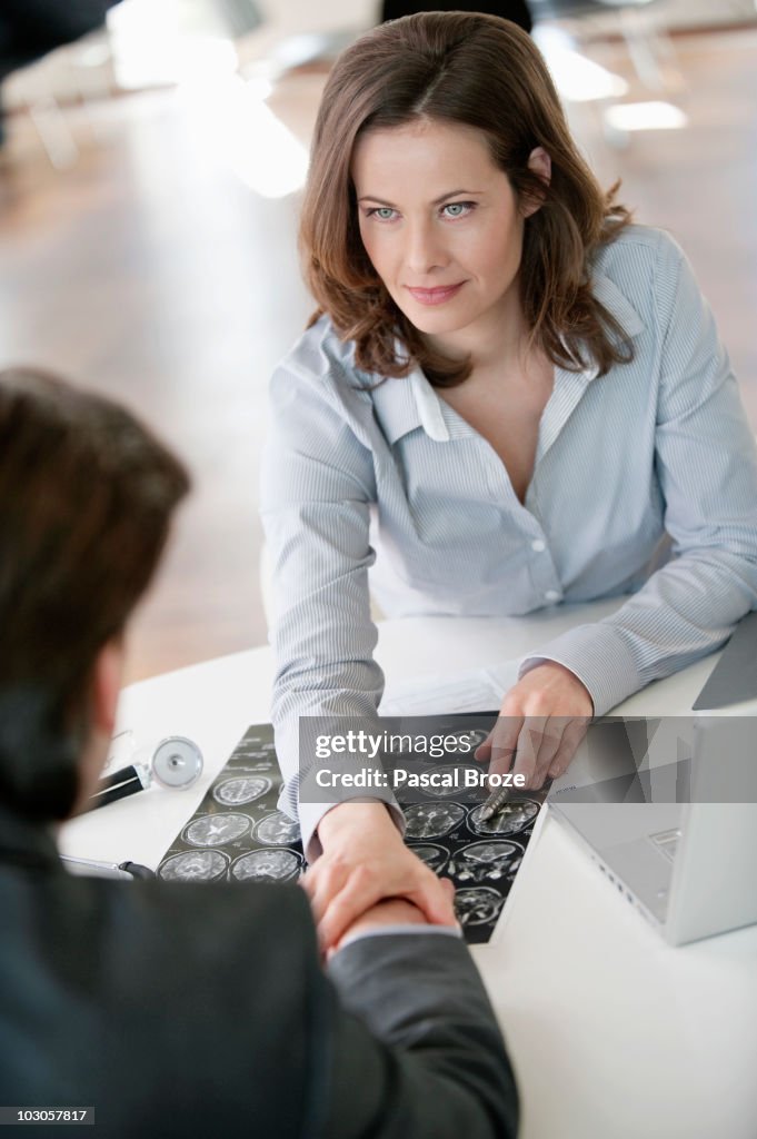 Doctor discussing with a patient