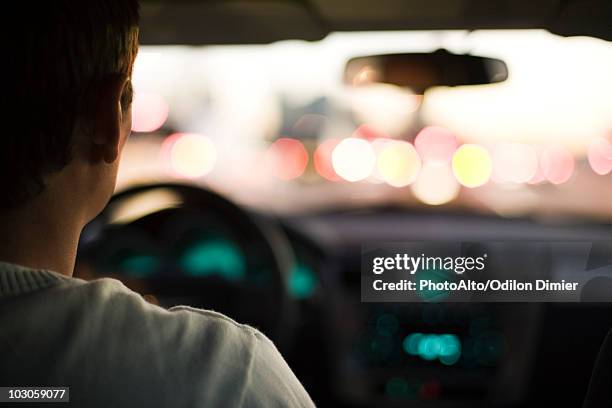 driving in rush hour traffic - auto silhouette stock-fotos und bilder