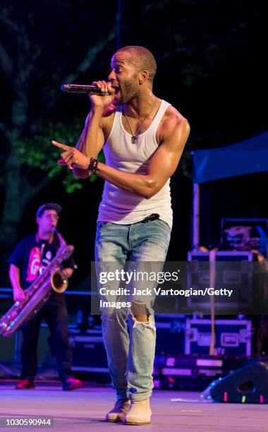 American Funk and R&B musician Trombone Shorty performs with his band Orleans Avenue at 'Voodoo Threauxdown' at Central Park SummerStage, New York,...