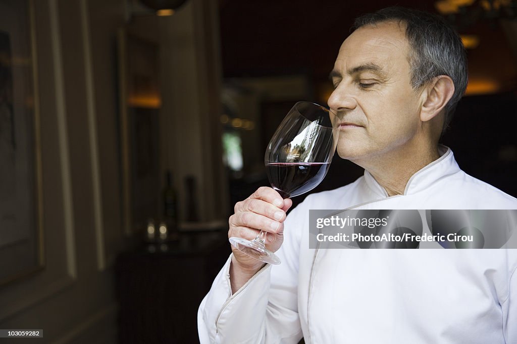 Chef appreciating wine bouquet