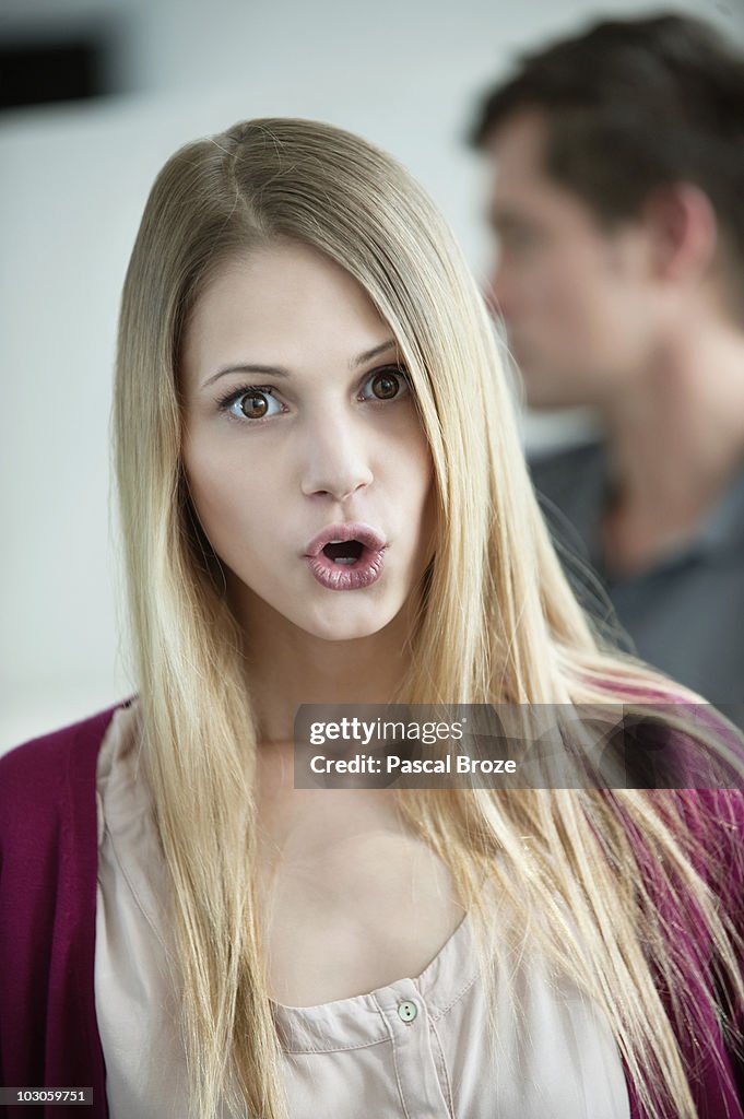 Portrait of a businesswoman looking surprised