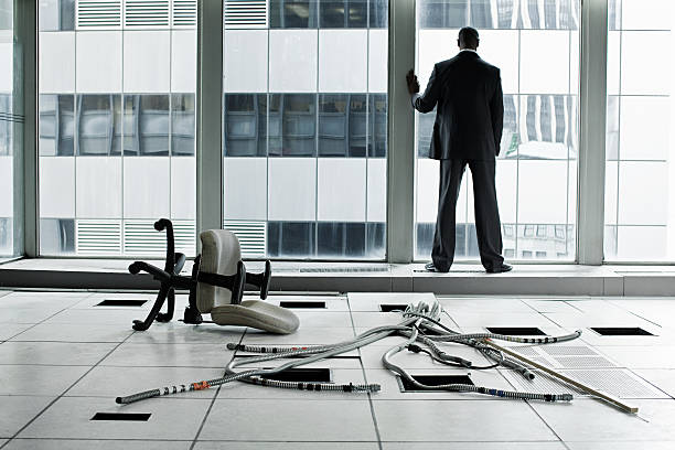 Businessman in abandoned office