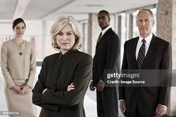 businesspeople in office - four people office stock pictures, royalty-free photos & images