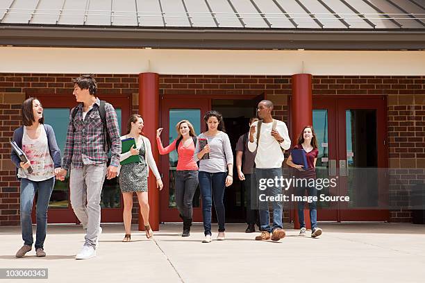 high school students leaving school building - prince william county virginia stock pictures, royalty-free photos & images