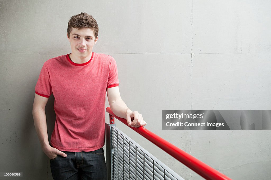 Man At Railing Young Man By Railing High-Res Stock Photo - Getty Images