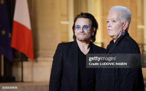 Irish lead singer of rock band U2, Paul David Hewson aka Bono and Gayle Smith , President and CEO of the ONE Campaign, deliver a statement in the...