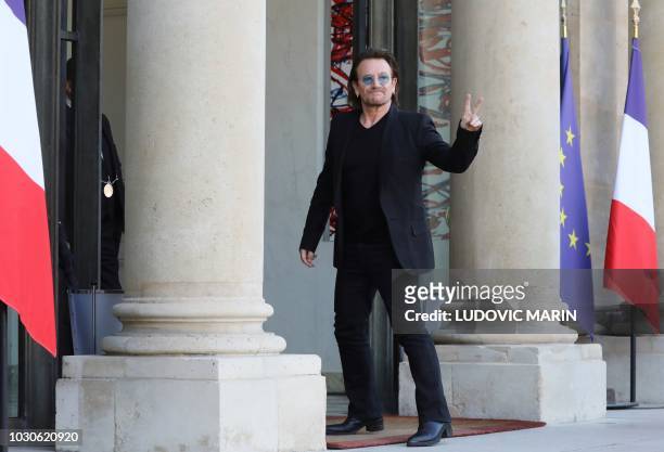Irish lead singer of rock band U2, Paul David Hewson aka Bono arrives at the Elysee Palace, in Paris, ahead of a meeting with French President, on...