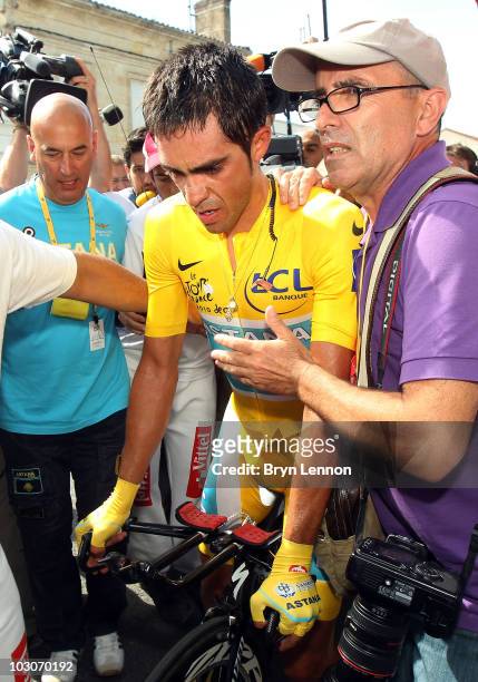 Alberto Contador of Spain and the Astana Team makes his way to the podium after stage nineteen, a 52km individual time trial from Bordeaux to...