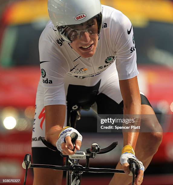 Andy Schleck of Team Saxo Bank crosses the finish line behind his nearest competitor Alberto Contador following stage 19 of the Tour de France on...