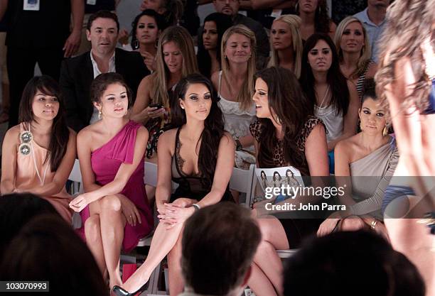 Selena Gomez, Kim Kardashian, Khloe Kardashian and Kourtney Kardashian attend the Beach Bunny Swimwear show during Mercedes-Benz Fashion Week Swim...