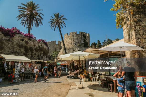 old town, rhodes, greece - wall and trench around fortress - rhodes old town stock pictures, royalty-free photos & images