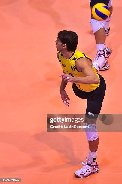 Gilberto Filho Giba tries during the match against Cuba as part of the FIVB World League Final Six at Orfeo Superdomo Stadium on July 24, 2010 in...