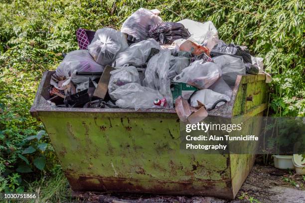 skip full of rubbish - skip hire stock pictures, royalty-free photos & images