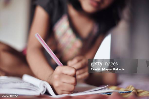 young girl (4-5 years) writing - kids writing stock pictures, royalty-free photos & images