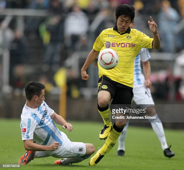Antonio Rukavina of Muenchen and Shinji Kagawa of Dortmund fight for the ball during the pre-season friendly match 1860 Muenchen v Borussia Dortmund...
