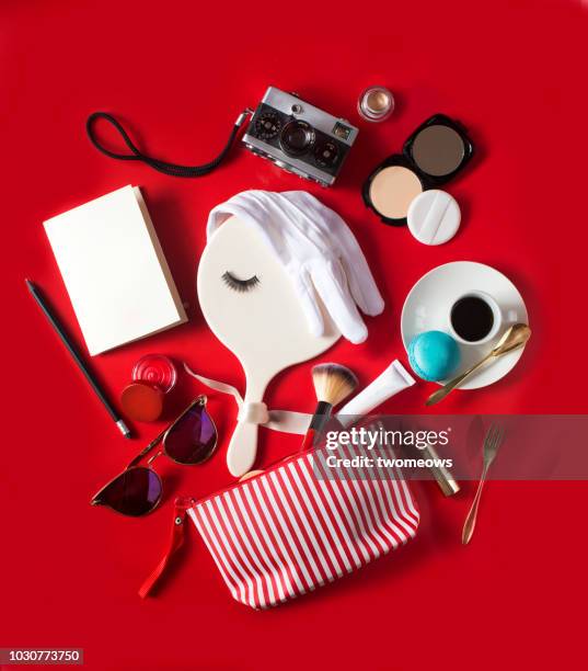 conceptual women's lifestyle retail still life. - cosmetics bag stock pictures, royalty-free photos & images