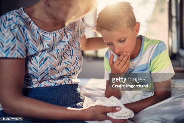 little boy is very sick - child sick stock pictures, royalty-free photos & images
