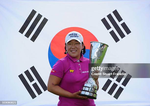 Jiyai Shin of South Korea holds the winners trophy after the final round of the 2010 Evian Masters on July 25, 2010 in Evian, France.