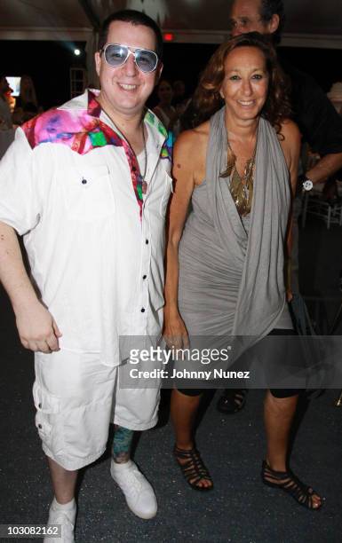 Noah G. Pop and Donna Karan attend the 11th annual Art For Life benefit party at Russell Simmons' East Hampton Estate on July 24, 2010 in East...