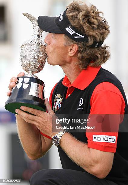 Berhard Langer of Germany celebrates with the trophy after winning the Senior Open Championship on July 25, 2010 at Carnoustie, Scotland.