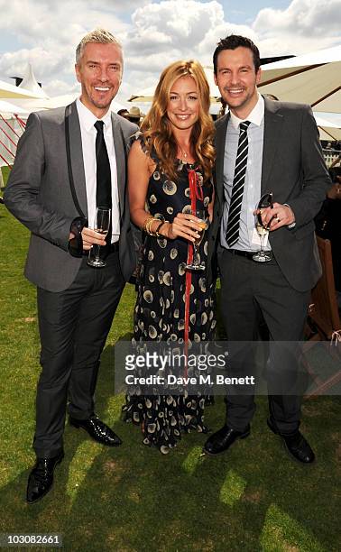 Justin Ryan, Cat Deeley and Colin McAllister attend the Cartier International Polo Day at Guards Polo Club on July 25, 2010 in Egham, England.