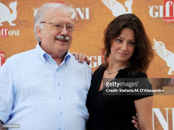 Author Gianni Mina and actress Giovanna Mezzogiorno attend a photocall during the Giffoni Experience on July 25, 2010 in Giffoni Valle Piana, Italy.