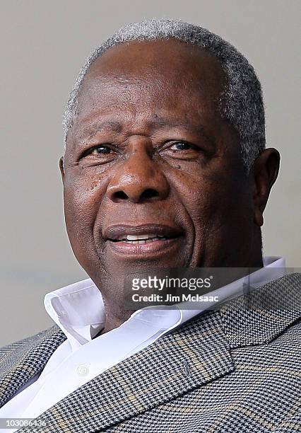 Baseball icon Henry Aaron attends the Baseball Hall of Fame induction ceremony at Clark Sports Center on July 25, 20010 in Cooperstown, New York.