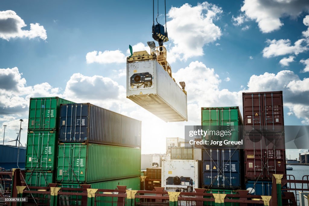 Refrigerated container being loaded on a container ship